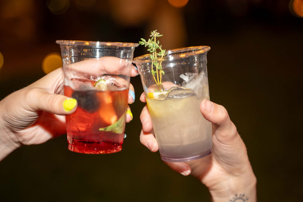 Two guests toasting with handcrafted refreshers